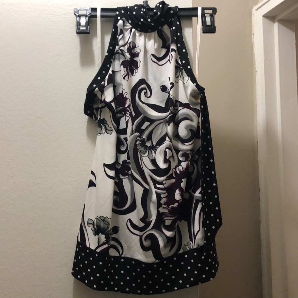 White Black and purple print top. Ties at neck